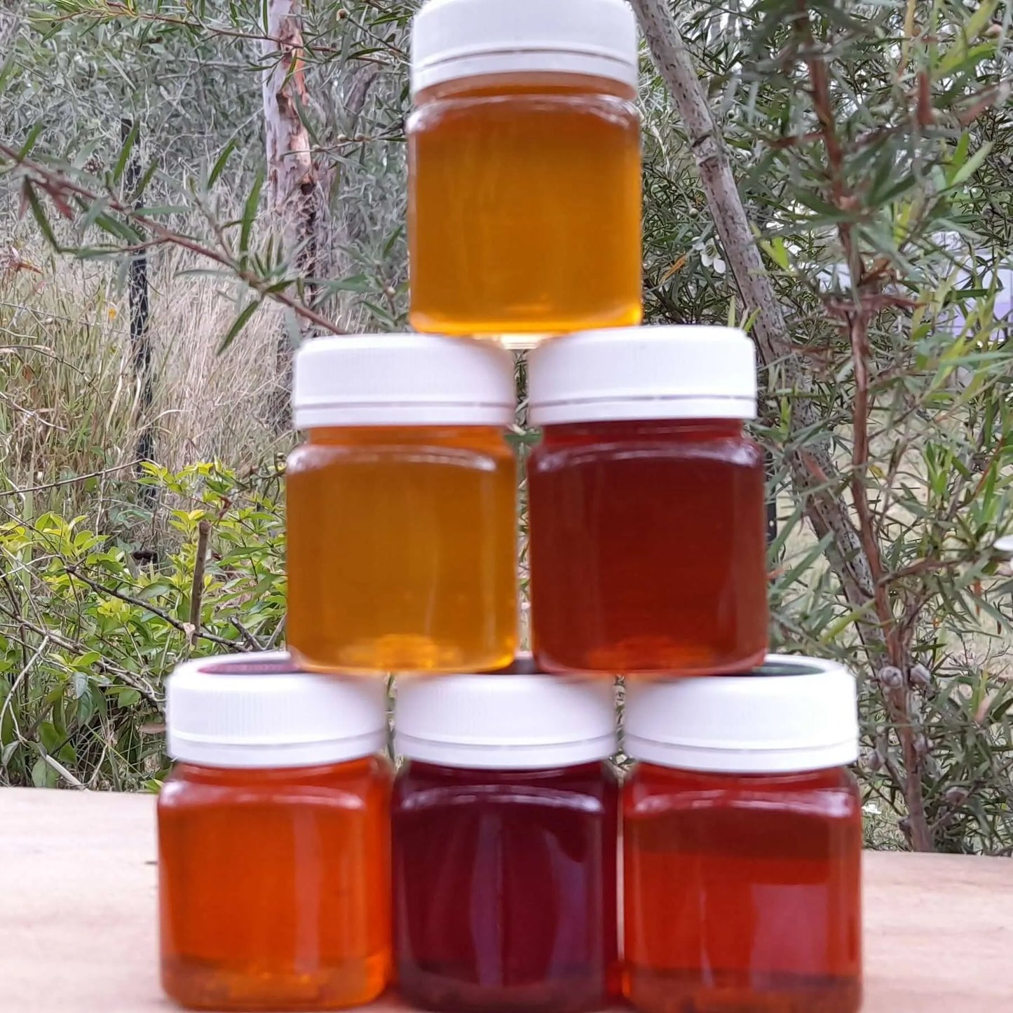 honey pyramid showing colour of honey variants